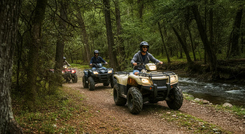 A group of friends riding ATVs in a wooded area.