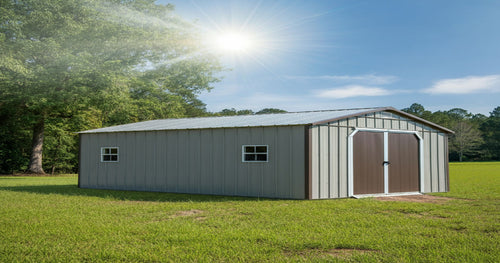 A hurricane-rated shed with a sloped roof and reinforced doors, built to endure high-speed winds