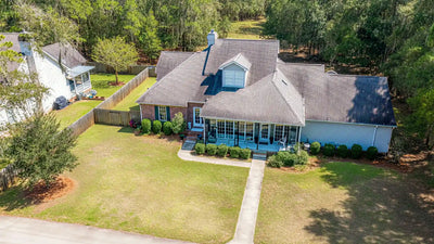 Interior of a converted prefab shed featuring a small living space with modern furnishings