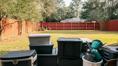A durable metal storage building set against a rural Alabama landscape, designed for extreme weather conditions