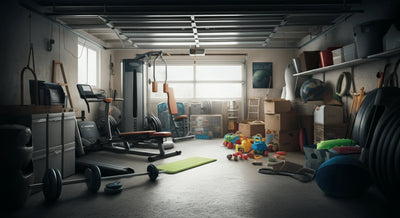 Cluttered garage with workout equipment, storage boxes, and children’s toys scattered around.