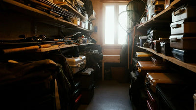 Sturdy metal rent-to-own shed in a backyard with garden tools neatly organized nearby.