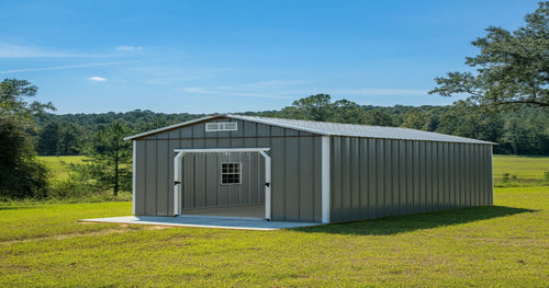 Metal Portable Garage in a Backyard Setting – A durable metal portable garage providing secure storage for a car and lawn equipment.